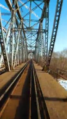 Vertical video. Fast flight over the railway. Filmed on FPV Drone.