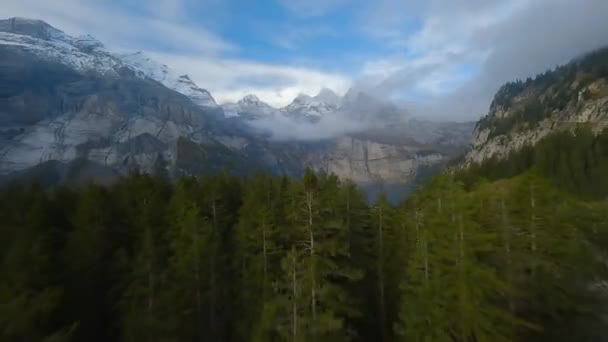 Fpv Fast Maneuverable Flight Trees Lake Oeschinensee Swiss Alps Cloudy — Stockvideo