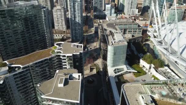カナダ ブリティッシュコロンビア州バンクーバーのダウンタウンの高層ビルの空中ビュー — ストック動画