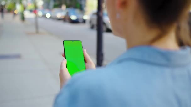 Woman Going Street Using Smartphone Green Screen Back View Communication — Stock Video