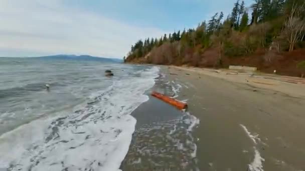Fpv Drone Flies Low Coast Small Waves Washing Beach Vancouver Video Clip