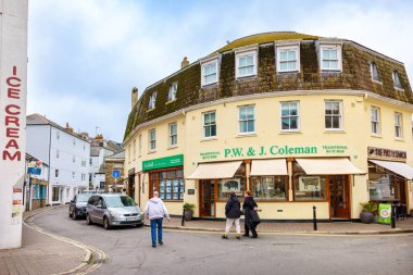 Salcombe, Devon, England - October 11, 2023: View looking down Fore street in town centre clipart