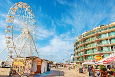 Sunny Beach, Bulgaria - July 11, 2024: View of seaside promenade along the beach clipart