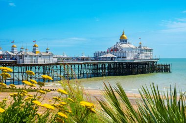 View of seaside Eastbourne Pier at English channel. Eastbourne, East Sussex, England  clipart