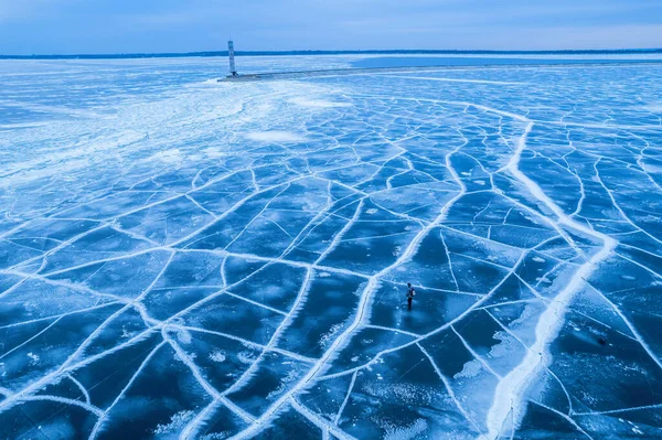 Aerial View Lonely Lighthouse Frozen Sea Frozen Blue Ice Cracks — Stock Photo, Image