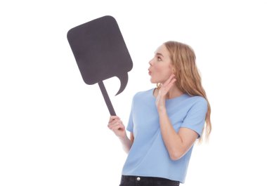 Wow. Surprised lady holding white empty board for advertisement and looking at camera with open mouth, isolated on white. Woman with blank advertisement placard, empty space for text