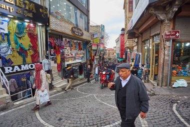 ISTANBUL, ISTANBUL - APRIL 21, 2017: Everyday life on the market street near Grand Bazaar in Istanbul. Turkey. clipart