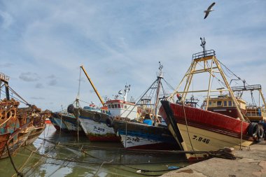 ESSAOUIRA, MOROCCO. 13 th February, 2017: Typical blue fishing boat on the coast of Essouira, Morocco. The city was called Sidi Megdoulin in 11th-century