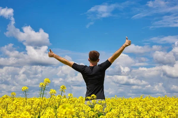 Attractive Man Arms Outstretched Handsome Young Man Standing Field Blooming — 图库照片