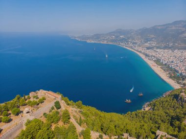 Drone photo of Alanya coast with Mediterranean turquoise sea and mountains, Turkey