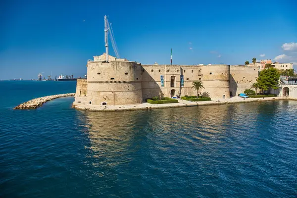 stock image Aragonese Castle of Taranto and revolving bridge on the channel between Big and Small sea, Puglia, Italy, Blue sunny sky