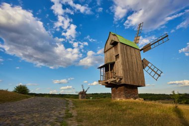 Old Ukrainian windmill under dramatic skies, Kiev, Ukraine clipart