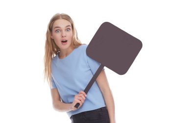 Wow. Surprised lady holding white empty board for advertisement and looking at camera with open mouth, isolated on white. Woman with blank advertisement placard, empty space for text