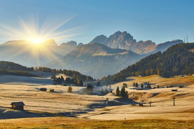 Sunrise at Alpe di Siusi in the Dolomites, autumn clipart