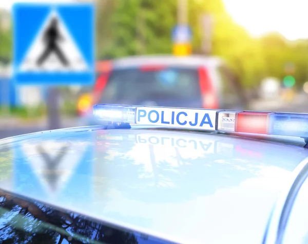 Police Car Catches Road Pirates Pedestrian Crossing lizenzfreie Stockbilder