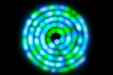 Sarmal dairede soyut mavi ışıklar, soyut tatil arka planı