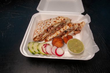 Traditional mexican delicacy known as a chicken quesadilla