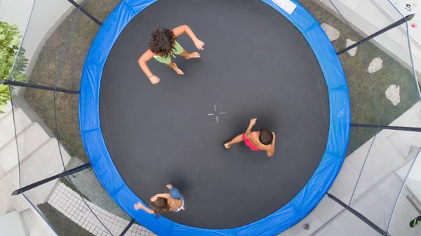 Children Playing Trampoline Aerial View Together — Stock Photo, Image