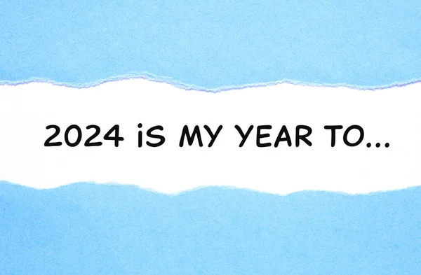 書かれた見出し2024が付いている新年2024決議リストについての動機づけの概念カードは私の年です ロイヤリティフリーのストック画像