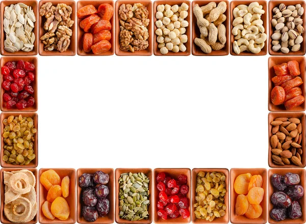 Seamless flat lay food frame of dehydrated fruits, seeds and nuts on white. Non-perishable antioxidant gluten free foods concept