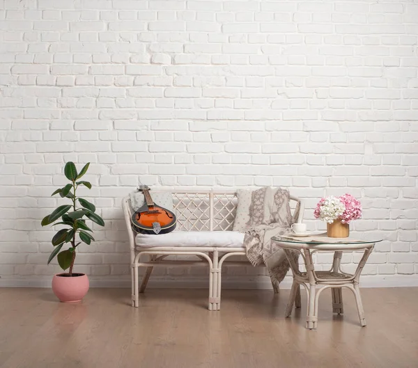 stock image Country style Rattan Living Room Loveseat on white brick wall background