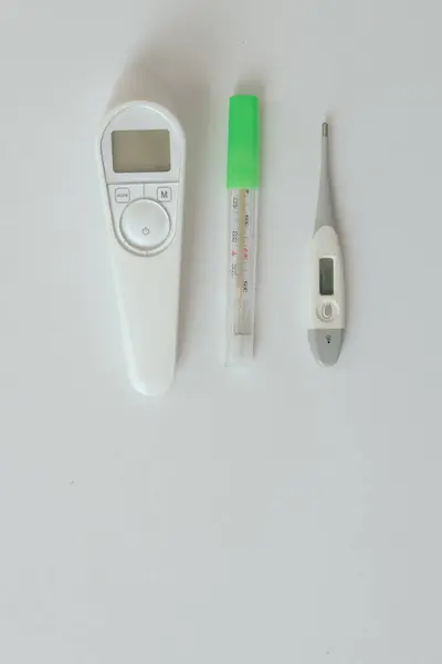 Comparison Mercury Thermometer Infrared Electronic Thermometer Baby Thermometer Measuring Human Royalty Free Stock Images