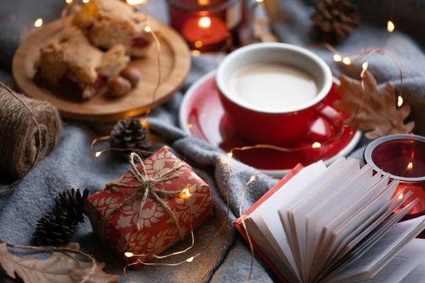 cozy background - cup of coffee, gift and candle