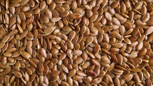 Top View Close Flax Seeds Rotating Background — 图库视频影像