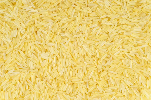 Long Parboiled Rice Background — Stock Photo, Image
