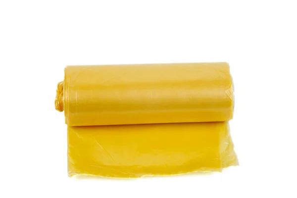 Roll Žluté Plastové Pytle Odpadky Izolované Bílém Pozadí — Stock fotografie