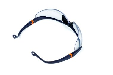 Plastic safety goggles isolated on white background