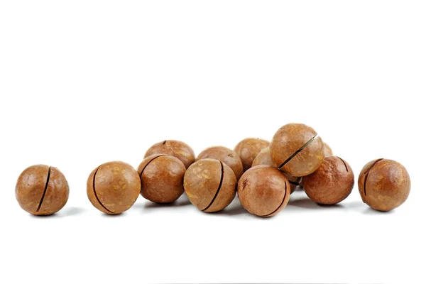 Unshelled Macadamia Nuts White Background — Stock Photo, Image
