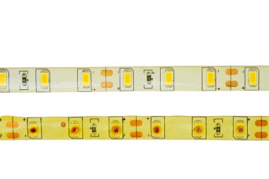 Yeni ve yanmış LED kurdele beyaz arkaplanda izole edilmiş