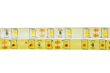 Yeni ve yanmış LED kurdele beyaz arkaplanda izole edilmiş