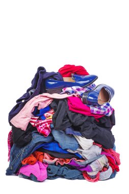 Big pile of old, used clothes isolated on white