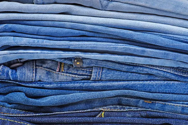Stapel Verschillende Blauwe Jeans Achtergrond Stockafbeelding
