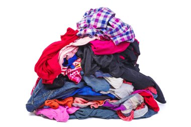 Big pile of old, used clothes isolated on white background