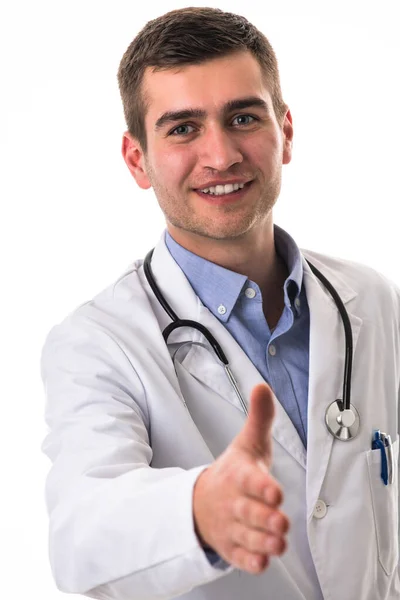 一个医生伸出他的手作为对一个有着白人背景的病人的支持的画像 高质量的照片 — 图库照片#