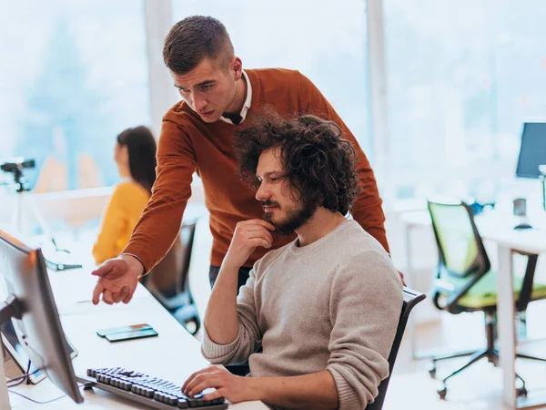 Two Men Discuss Project While Looking Computer Monitor Modern Office — Stock Photo, Image