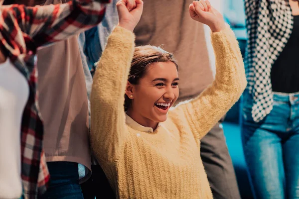 stock image Photo of business women in wheelchairs with their hands raised in the air with their colleagues, together celebrating business success. 