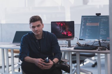 Programming. Man Working On Computer In IT Office, Sitting At Desk Writing Codes. Programmer Typing Data Code, Working On Project In Software Development Company.  clipart