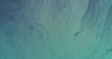 Top down aerial view over natural texture - abstract industrial lake water patterns. Turquoise waternature poluttion. Hi quality 4K footage. 