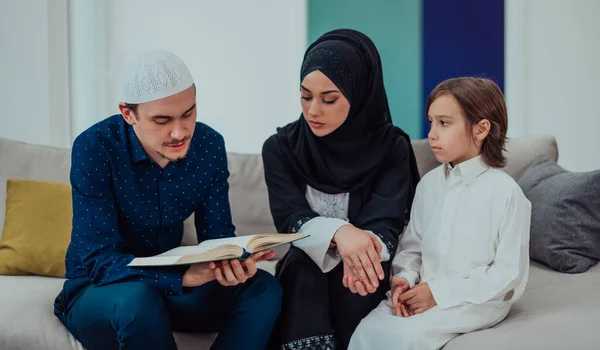 Happy Muslim Family Enjoying Holy Month Ramadan While Praying Reading — Stockfoto