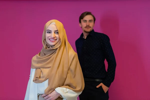 Portrait Happy Young Muslim Couple Standing Isolated Pink Background High — Zdjęcie stockowe