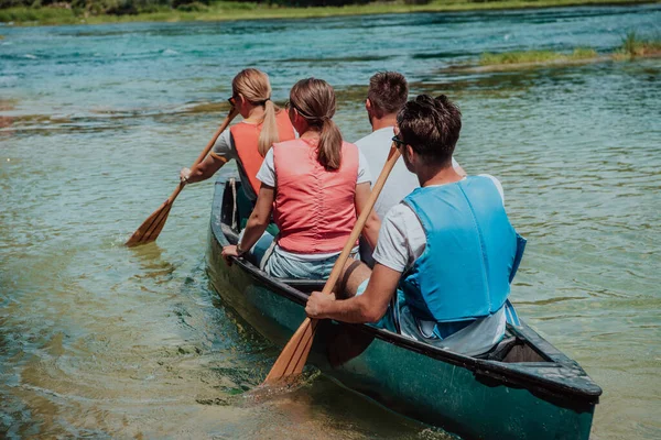 Group Adventurous Explorer Friends Canoeing Wild River — Stock Photo, Image