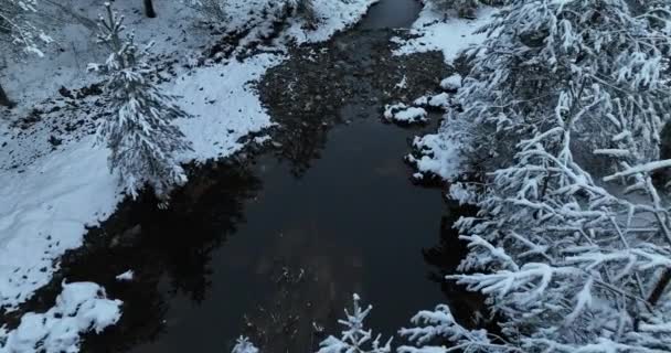 Aerial View Frozen River Flowing Snow Covered Forests Cloudy Sunset — Αρχείο Βίντεο