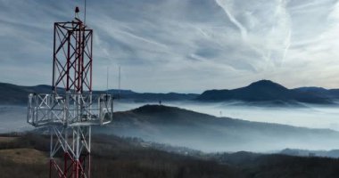 Aerial View. Flying over the high mountains in beautiful clouds. Aerial Drone camera shot. Air pollution clouds over Sarajevo in Bosnia and Herzegovina. Hi quality 4K footage. 