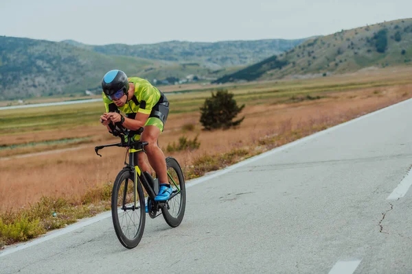 Full Length Portrait Active Triathlete Sportswear Protective Helmet Riding Bicycle — Fotografia de Stock
