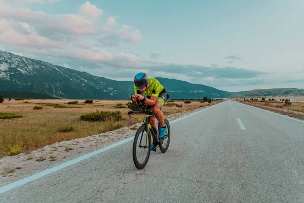Full Length Portrait Active Triathlete Sportswear Protective Helmet Riding Bicycle — Zdjęcie stockowe