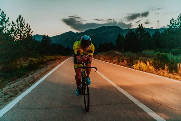 Night Drive Full Length Portrait Active Triathlete Sportswear Protective Helmet — Zdjęcie stockowe